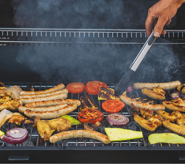 Friends gathered at a lakeside barbecue
